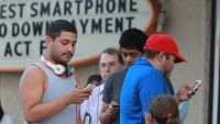 Frenzy over iPhone takes scary turn - Photo