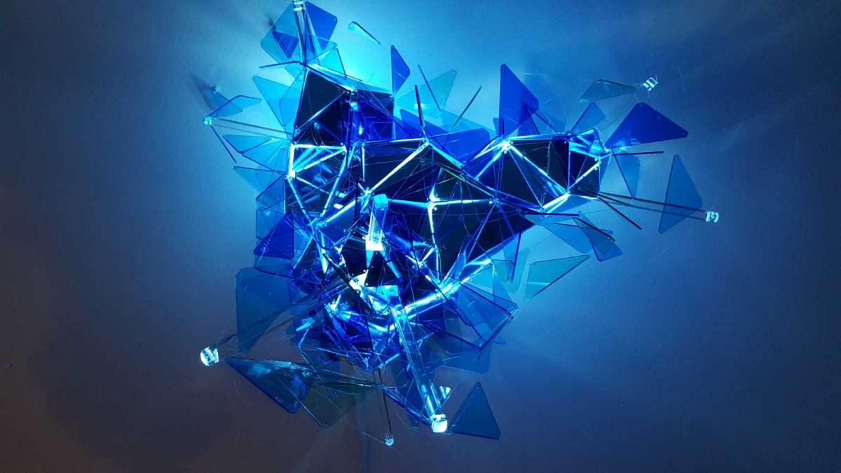 Multi-media artist Adela Andea's show "Glacial Parallax" includes a number of sharp-looking light sculptures made with hand-cut plexiglass.